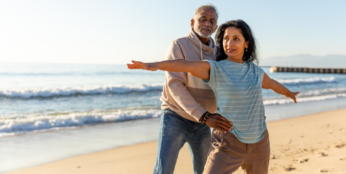 Women and man doing yoga